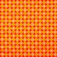 Tela patchwork florecitas geométricas sobre naranja