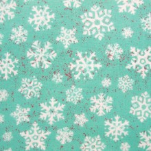 Tela patchwork cristales de nieve sobre turquesa