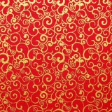 Tela patchwork de Navidad espirales doradas sobre rojo 1